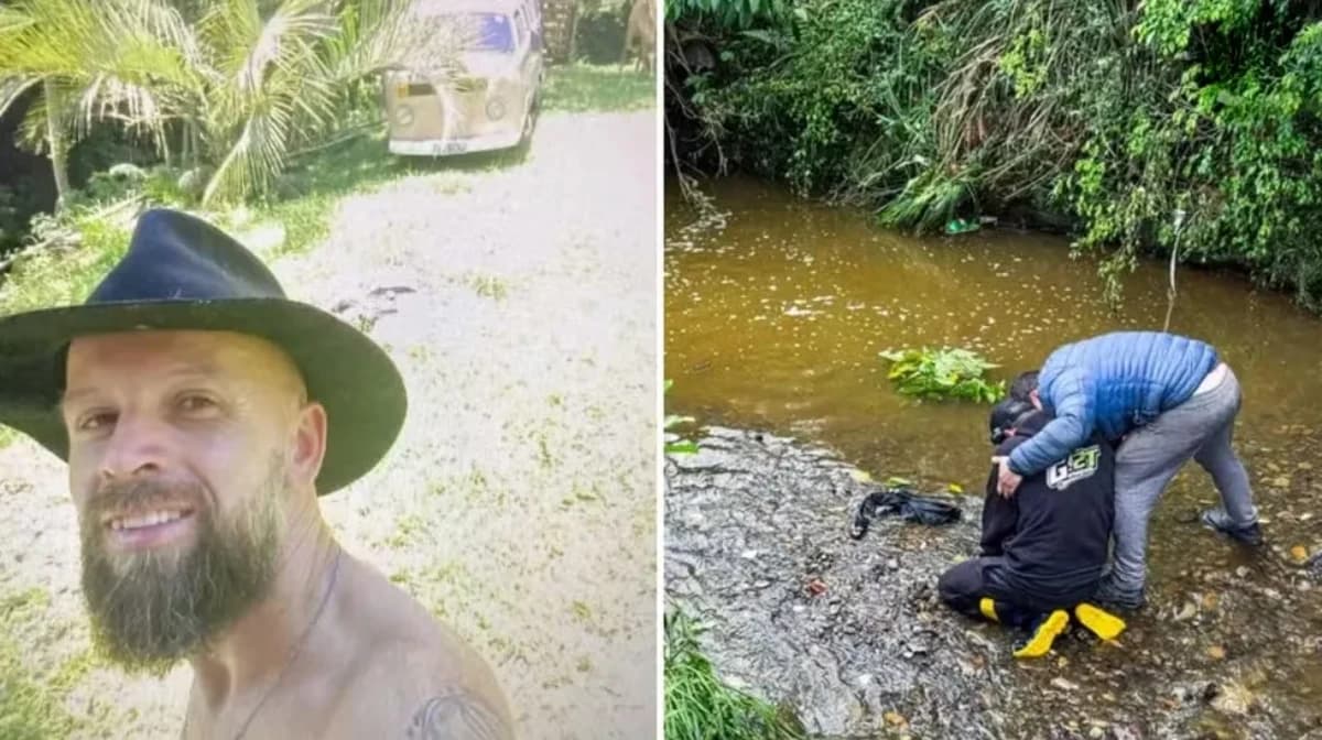 Filho de Édson Luís da Silva, 46 anos, é consolado à margem de arroio após corpo do pai ser encontrado — Foto: Neimar De Cesero/Agência RBS